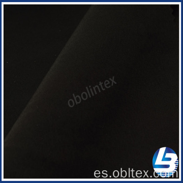 Obl20-2614 tejido de piel de melocotón para ropa de trabajo